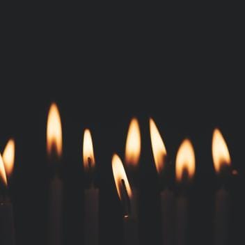 Candles lit with a black background